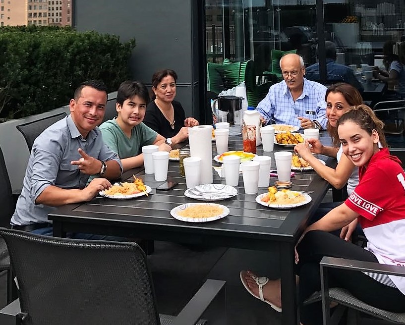 Flyhomes home buying clients - family at outdoor table