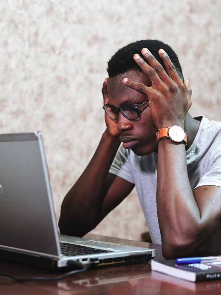 man working using a laptop