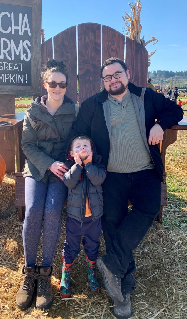 family at a pumpkin patch